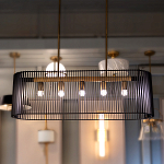 Люстра подвесная овальной формы с металлическим решетчатым абажуром матово-черного цвета и 5 лампами Kichler варинант исполнения - 7 | Loft Concept в Перми