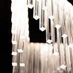 Люстра золотого цвета в форме галочки с каскадом длинных прозрачных трубок Eurofase варинант исполнения - 11 | Loft Concept в Перми